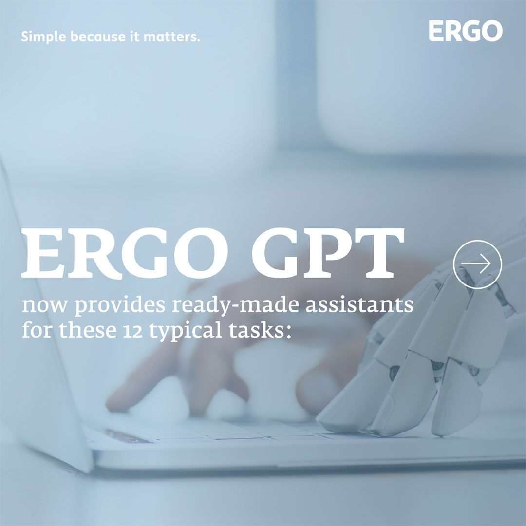 A human hand and a robotic hand typing on a laptop.