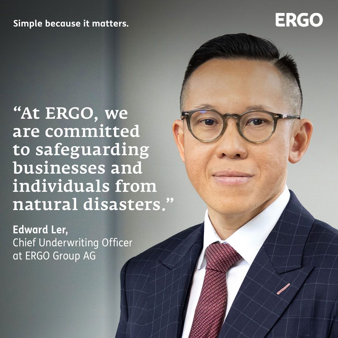 Portrait photo of Edward Ler in front of a gray background.