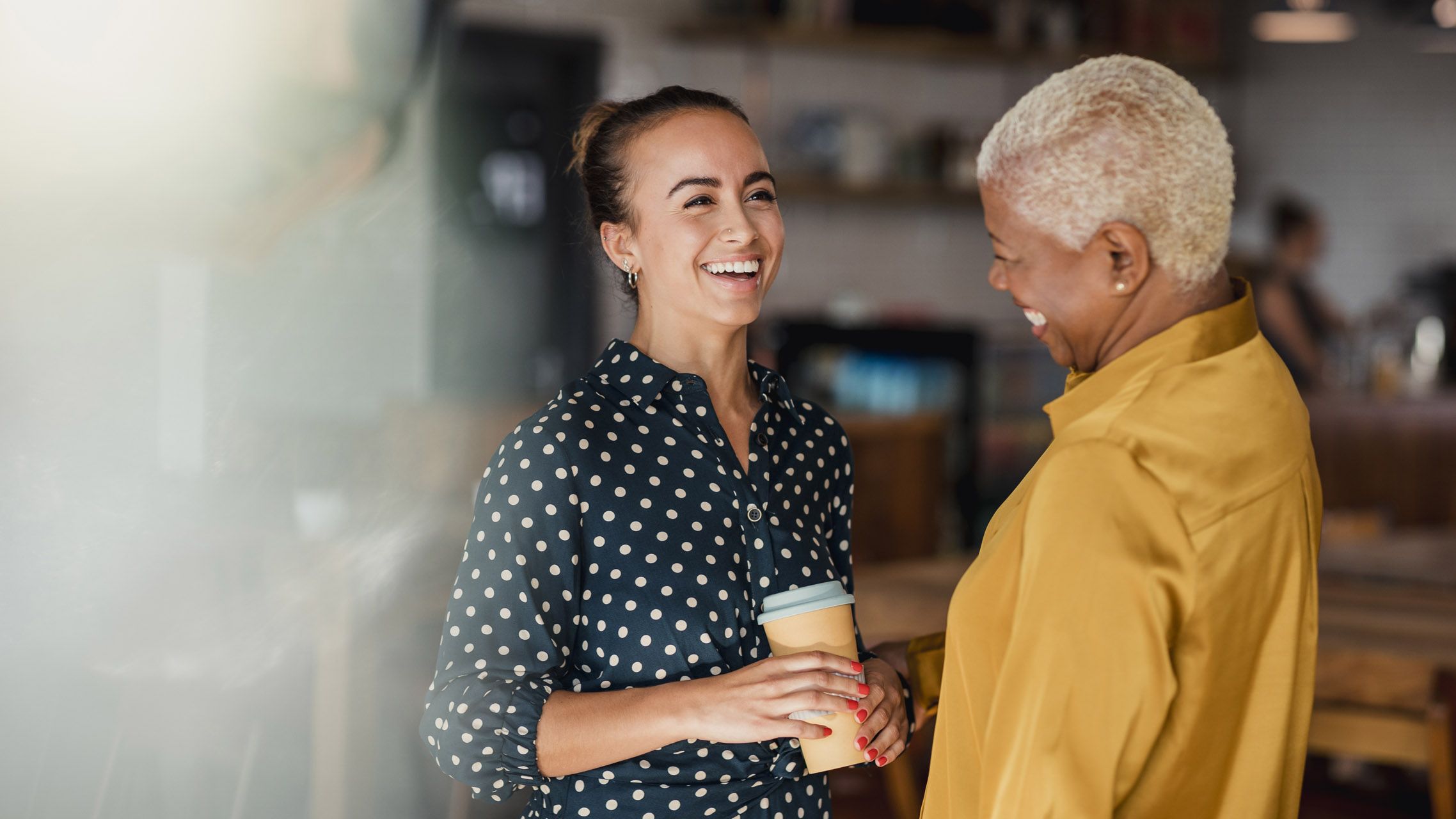 Two smiling women