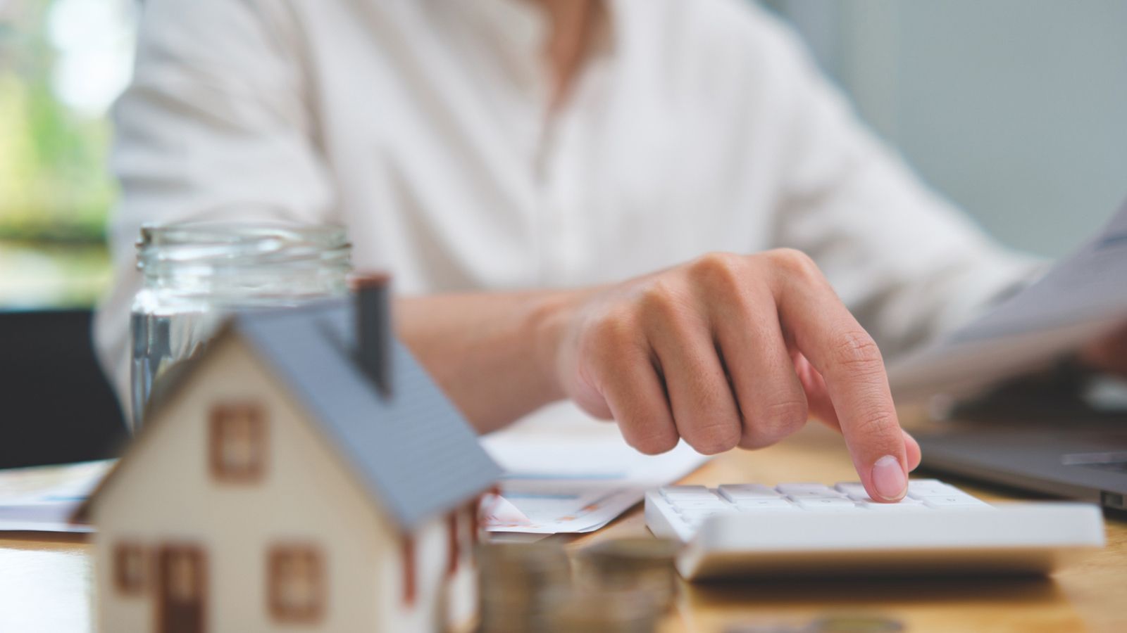 Man sits at a desk and works.