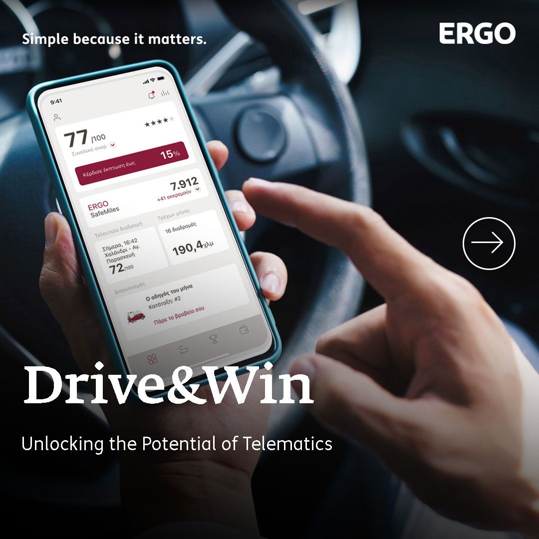 Male hands typing something into a mobile phone in front of a steering wheel in a car